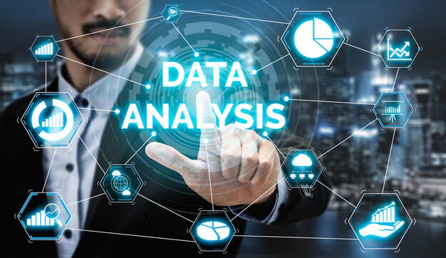 Businessman touching virtual screen with "Data Analysis" surrounded by analytics, graphs, and technology icons on digital interface.